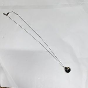 BaubleBar silver with black/white stone